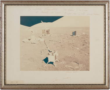 NASA Apollo 17 Gene Cernan Signed Photo of Moon: Astronaut Gene Cernan (American, 1934-2017) signed NASA&nbsp;photo from the Apollo 17 Lunar Landing in 1972, showing ALSEP equipment placed on the surface of the moon. The photograph is mounted to a w