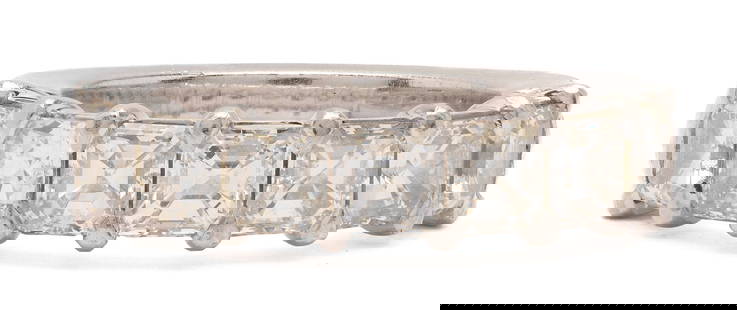 Platinum Diamond Anniversary Band: Ladies platinum anniversary band featuring seven (7) Asscher cut diamonds approximately 2.37 carats together, Clarity-VS2, Color-H. The ring is marked "Plat Kimball's" and XRF tests 95% platinum. The