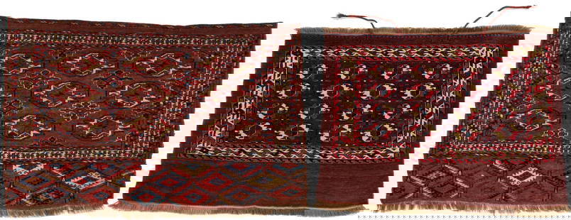 2 Antique Yomut or Yomud Chuval Rugs: Two (2) antique Yomud or Yomut Turkmen Chuval rugs, wool on wool, both with central deep rust or brick red field, one rug with three rows of three guls and one rug with four rows of four guls. One