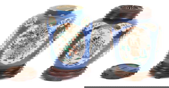 Pair Chinese Porcelain Ginger jars, Powder Blue Ground: Two Chinese porcelain ginger jars, Famille Verte on powder blue ground, with reserves depicting figures engaged in varying activities including riding on&nbsp;horseback and sword fighting. One jar has