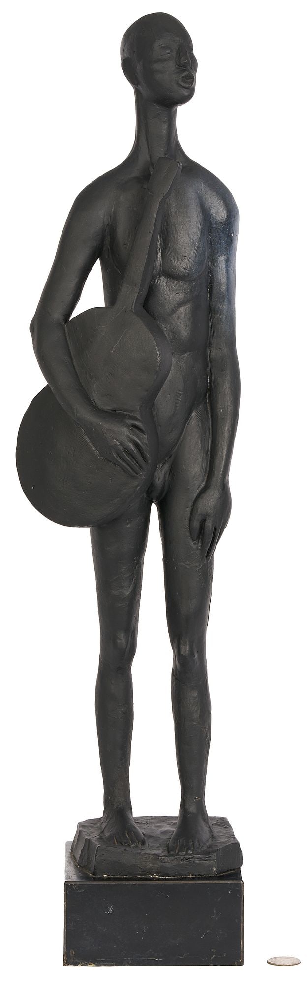 Meyer Wolfe Sculpture: Standing Man with Guitar: Meyer (Mike) R. Wolfe (New York/California/Tennessee, 1897-1985) plaster sculpture with black paint depicting a standing nude man, singing, as he holds a guitar in his right hand. Mounted onto a