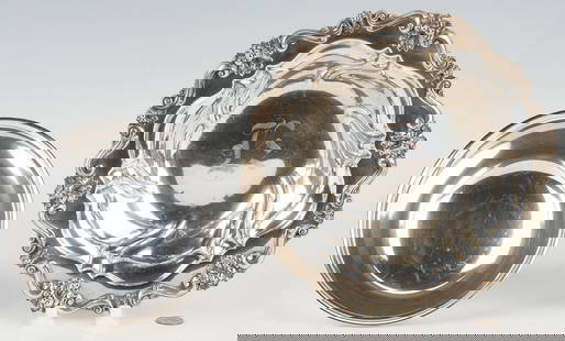 2 Sterling Serving Bowls, International and Revere: Two (2) sterling silver serving bowls, including one International bowl with a floral border and monogram, measuring 11 in. dia, and one Newport Revere-style footed bowl measuring 7 5/8&nbsp;in. dia.&