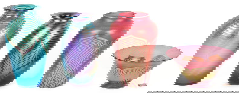 4 Studio Art Glass Pieces: Four (4) pieces of Studio Art Glass including one pink Correia vase, one blue Correia vase, and one pink Correia bowl, all with iridescent pulled feather designs, having etched signatures and dates on