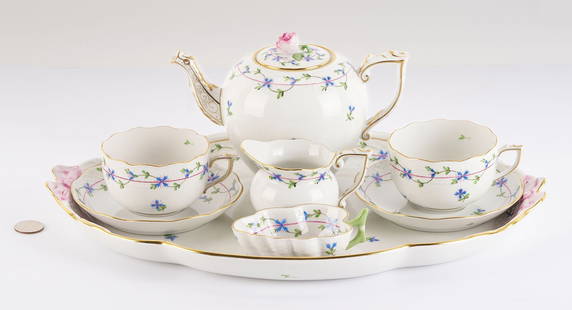 Herend Blue Garland Pattern Porcelain Tea Service, 8 pcs: Herend Blue Garland pattern porcelain tea service, consisting of eight (8) pieces including a teapot with rose finial, two coffee cups and saucers, creamer, sugar bowl, and serving tray. All pieces