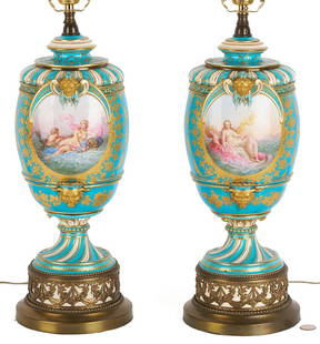 Pair Sevres or Sevres Style Porcelain Vase Lamps: Pair of French Sevres or Sevres style polychrome porcelain covered vases, now mounted as lamps, urn form with differing vignettes of Venus to one side and birds and butterflies to the reverse on a tur