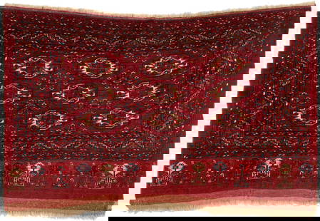 Antique Yomud or Yomut Turkmen Chuval: Antique Yomud or Yomut Turkmen Chuval rug, wool on wool, central deep rust or brick red field with three rows of three guls, red stylized floral lower elem panel. Woven in colors of rust,