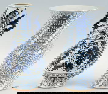 2 Large Chinese Blue & White Porcelain Vases: Two (2) large Chinese blue and white porcelain vases. 1st item: Chinese blue and white porcelain beaker form vase with allover scrolling foliate decoration. Double Joy hallmark to the neck and body.