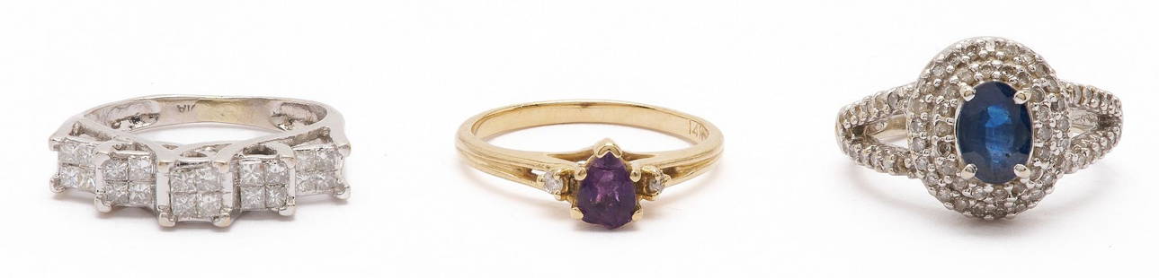 Three 14K Gold & Gemstone Rings: 1st item: Ladies 14K white gold ring featuring twenty (20) princess cut melee diamonds pave set in groups of four (4) to emulate five (5) larger stones. The ring XRF tests 14K gold and is size 5 1/4.