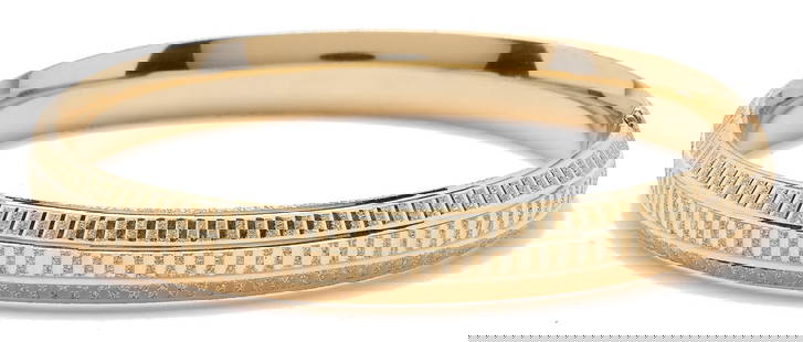 14K Gold Diamond Cut Bangle Bracelet: Ladies 14K yellow gold diamond cut bangle bracelet. The bracelet is marked "UC 14K" and XRF tests 14K gold. The bracelet is 7 in. L. and has a weight of 12.63 grams. Additional high-resolution photos