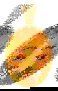 14K Gold & Citrine Pendant: Ladies 14K yellow gold pendant featuring one (1) oval cut citrine approximately 59.04 carats. The pendant XRF tests 14K gold. The pendant is 1 1/2 in. x 1 in. and has a gross weight of 22.97 grams. Ad