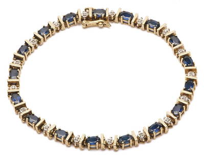 14K Gold, Sapphire, & Diamond Bracelet: Ladies 14K yellow gold bracelet featuring seventeen (17) natural oval cut sapphires accented by seventeen single cut melee diamonds. The bracelet is marked &quot;14K&quot; and XRF tests 14K gold. The