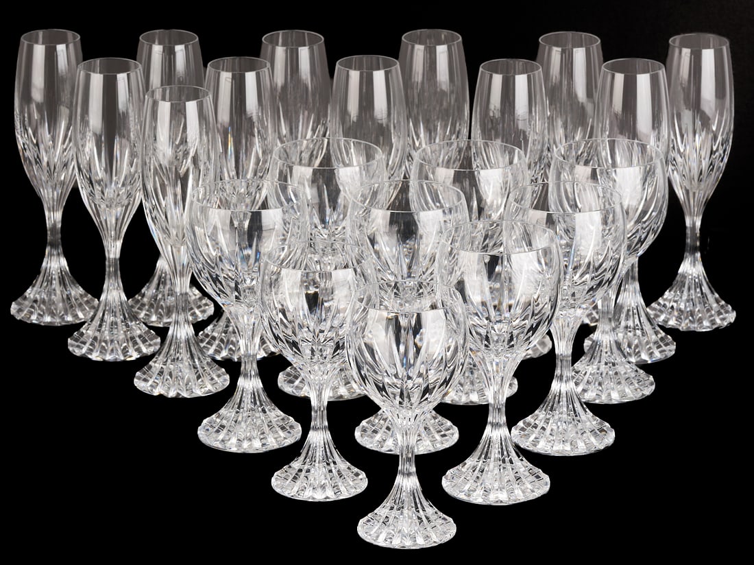 21 Baccarat Messena Pattern Water Goblets: Set of twenty-one (21) Baccarat glasses in the Messena pattern. Etched Baccarat mark to the base. Twelve (12) champagne glasses (7 in. H), seven (7) wine glasses (6 7/8 in. H), and two (2) wine glasse