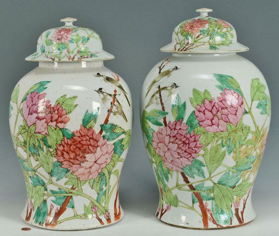 Pr. of Large Chinese Famille Rose Ginger Jars: Pair of large covered Chinese Export Famille Rose Ginger jars, baluster form having enameled bird amongst blossoming branch decoration with Chinese calligraphy and red seal marks. Finials of tops with