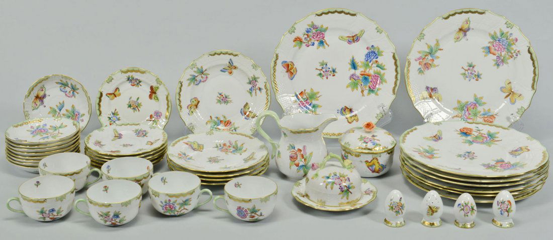 42 Pcs. Herend Queen Victoria Porcelain Dinnerware: Forty two (42) pieces of Herend Queen Victoria porcelain partial dinnerware set consisting of six (6) "Canton" cups (2- 1/8" H x 3-1/2" dia), nine (9) saucers (5-1/4" dia), se
