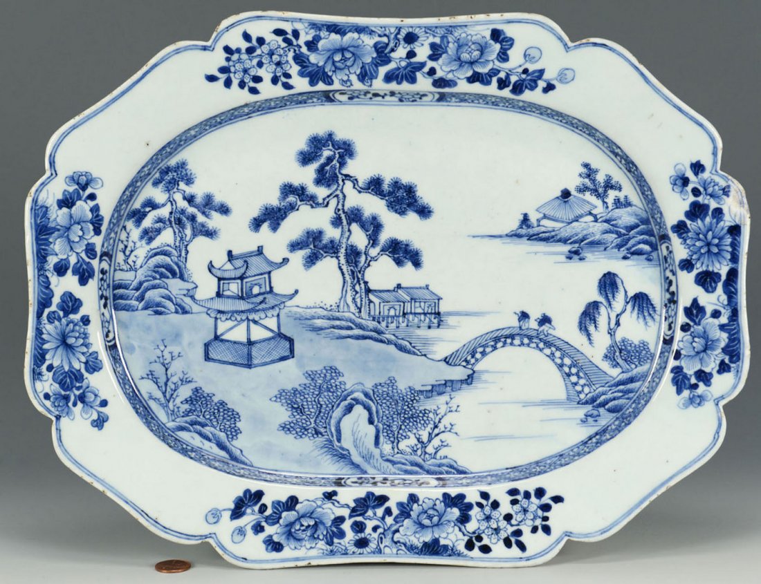 Blue and white tray with lobed octagonal sides: Blue and white porcelain tray or platter with lobed octagonal sides (cartouche shape) and blue and white Oriental style landscape (Willow type) design. 11-1/2" x 15". Unmarked. Chinese Expor