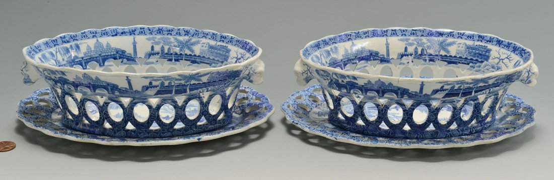 Pair Spode Blue and White Chestnut baskets, underplates: Pair blue and white oval shaped chestnut baskets with underplates, marks for Spode (Tiber pattern), blue and white landscape transfer pattern with bridges, towers, willows and buildings and pierced ov