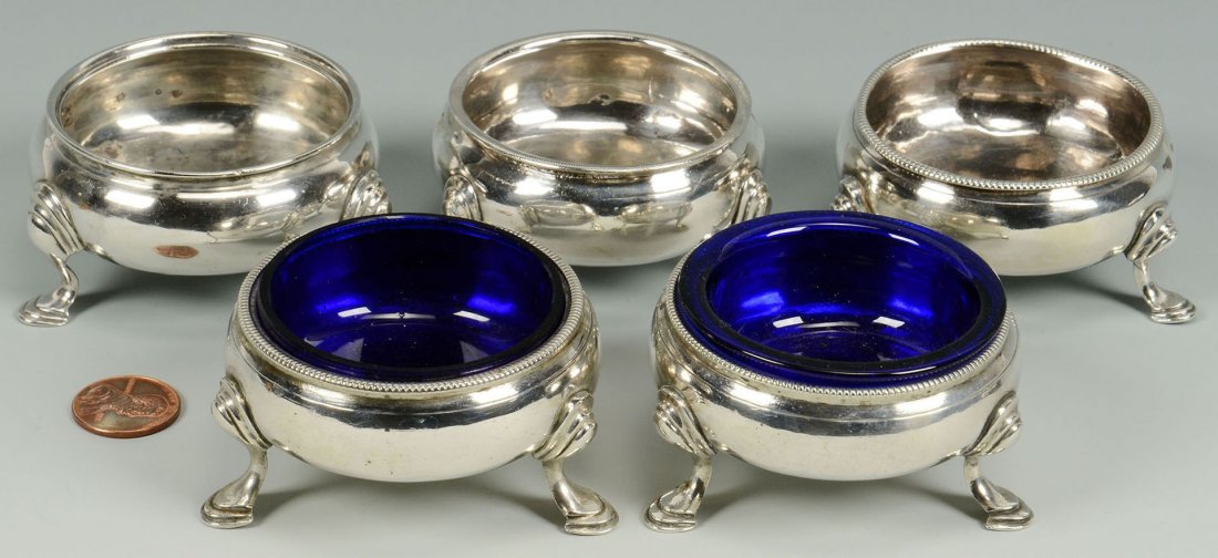 5 English Silver Salts: 5 Sterling silver footed salt cellars, all with assorted English hallmarks, circa 1850. All approximately 1 1/4" H x 2 1/3" dia. - 6.96 oz troy total weight. Provenance: the estate of Margar