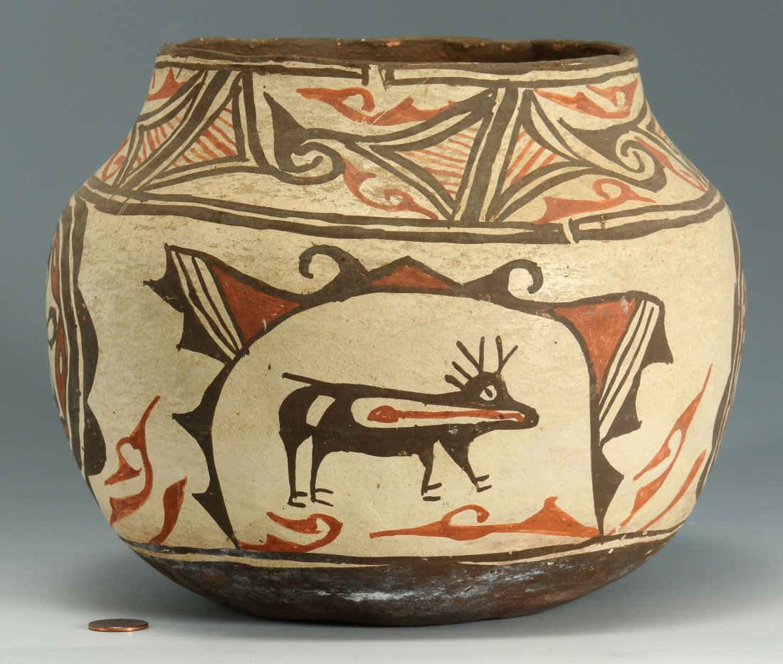 Zia Olla Jar w/ Heartline Deer Design: Zia Olla pottery jar with polychrome painted heartline deer and geometric designs, 7" H. 20th century.