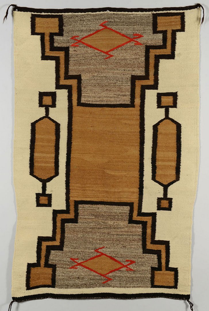 Native American Southwest rug: Native American Southwest rug, probably Navajo, woven in shades of black, brown, grey and red. 58" x 37". First half 20th century.