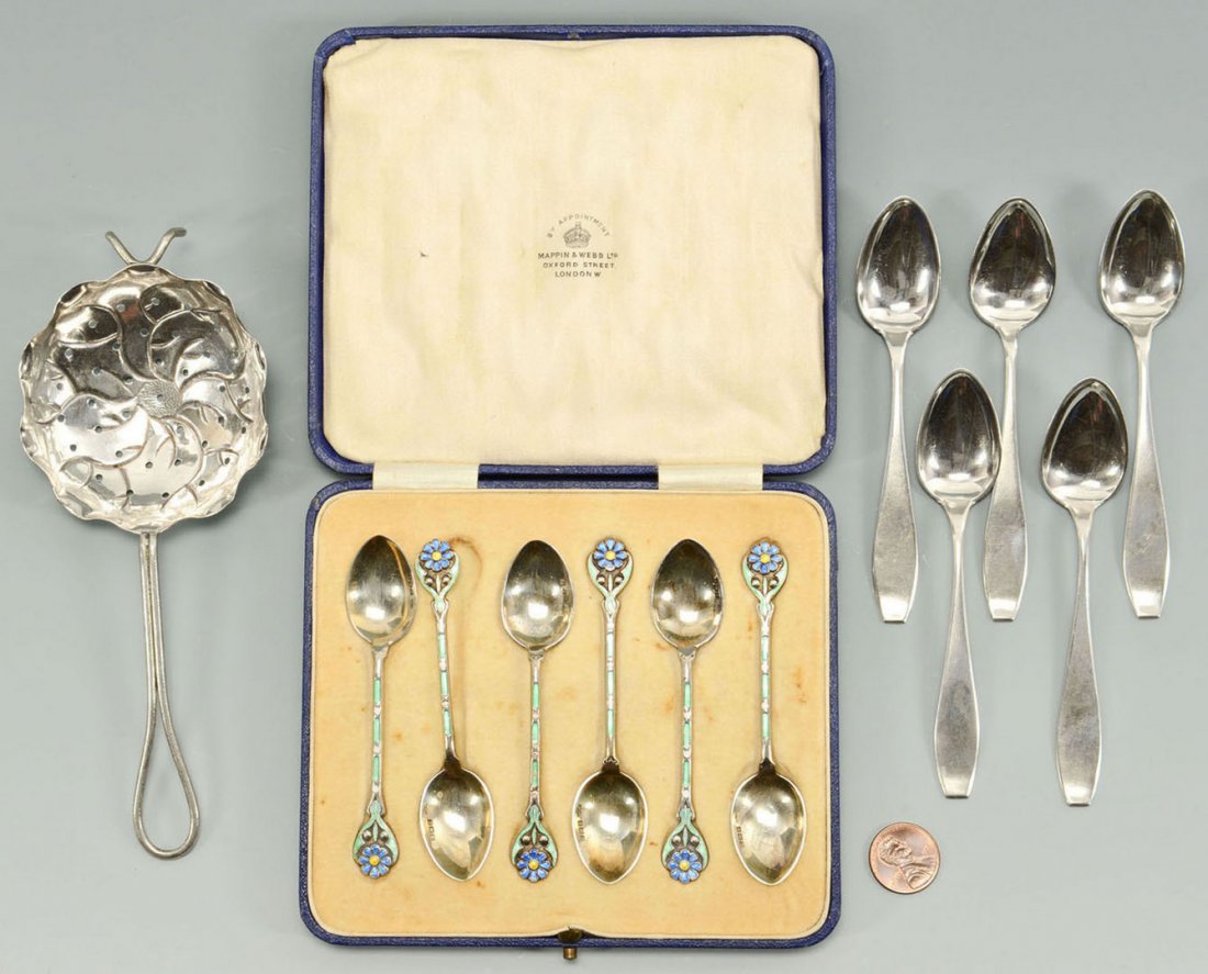 Continental tea Strainer and 12 coffee spoons: 1 Sterling silver tea strainer with petal chased bowl, wirework handle, possibly Russian, ca. 1900, 6 1/2" dia - 1.065 oz troy. Together with 6 Sterling silver coffee spoons, Continental, ca. 190