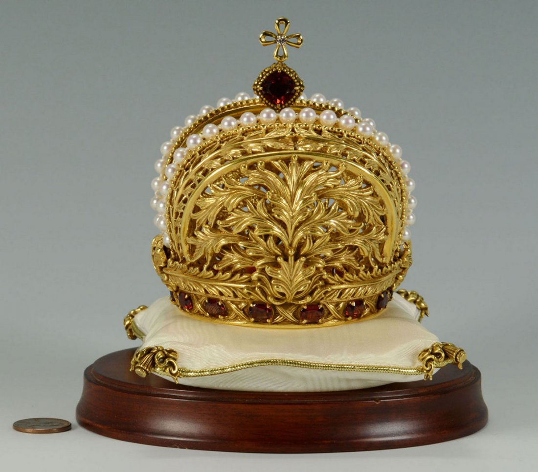 Sterling Gilt Crown with Faux Pearls and Red Stones: Contemporary vermeil crown with faux pearls and red stones in the style of Faberge. Base stamped "1988 FM Sterling .925 Faberge". 3 1/2" H x 3 3/8" W. Included with crown is a fabr