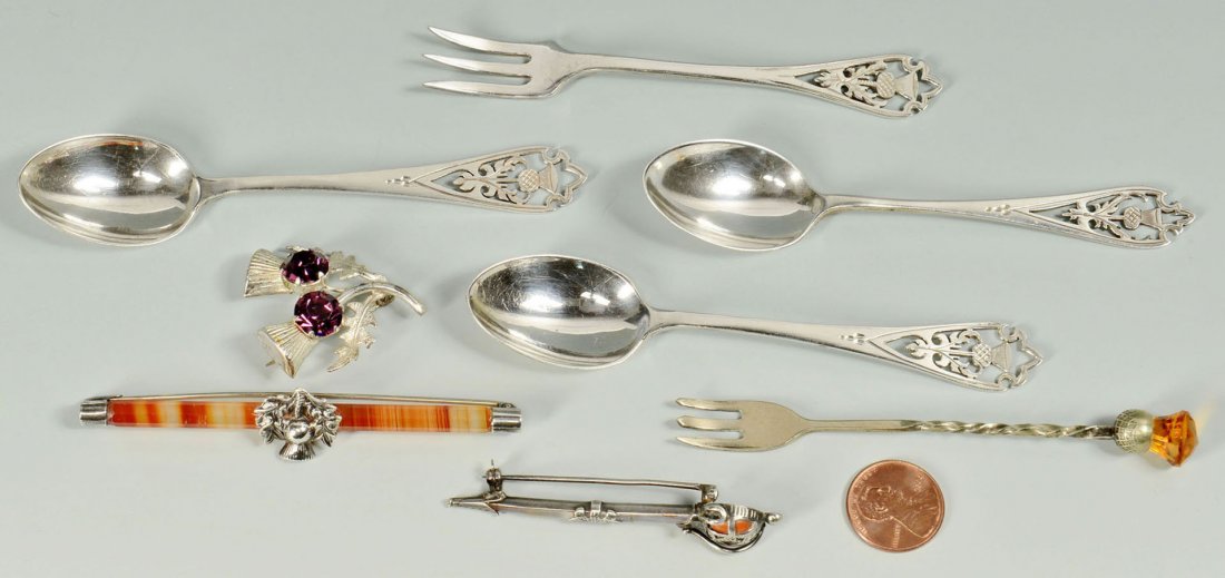 Scottish style Jewelry and Silverware: Group of Scottish style jewelry and silverware, many with thistle decoration. 1st group: Three pins including one straight bar pin with banded agate and silver metal thistle emblem mounted at center (