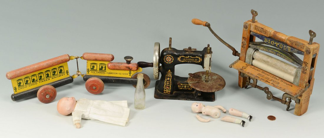 Collection of Toy and Salesman Sample items, 6 ite: 1st item: Child's Juvenile Cast Iron Sewing Machine with gilt trim, 6"h x 8"w. 2nd item: Salesman's Sample Bicycle Wringer by the Lovell Manufacturing Co. of Erie, Pennsylvania, 8" h x