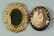 2 Mourning Brooches , one 14k with child in casket - 2