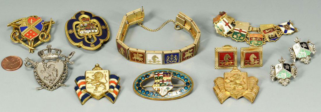 10 pcs enameled Jewelry inc. War Relief: Ten items of World War II era jewelry including War Relief Jewelry. Includes Accessocraft and Bundles for Britain "Dieu et Mon Droit" pins with lions and shields, Coro signed earrings with h
