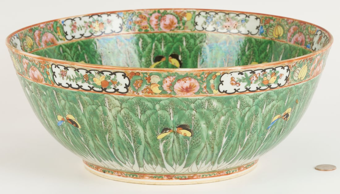 Chinese Famille Rose Cabbage Punch Bowl: Chinese Famille Rose porcelain punch bowl with green "cabbage leaf" decoration together with alternating floral vignettes, butterflies, shou symbol to the bowl interior, and gilt rim.