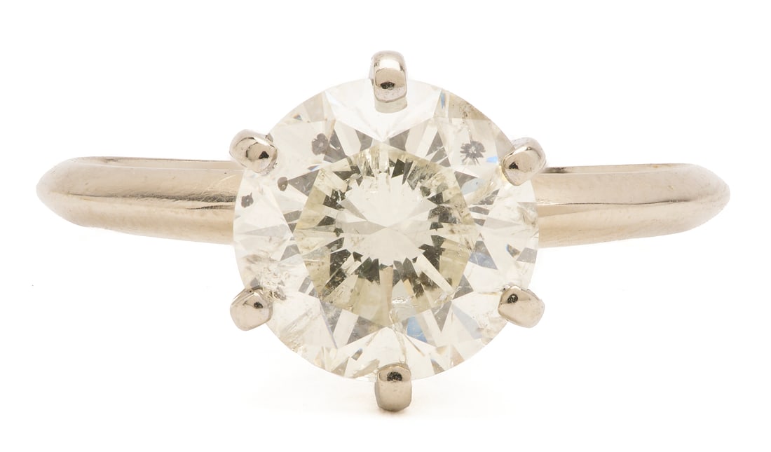 3.10 ct. Diamond Ring: Ladies' 14K white gold solitaire engagement ring featuring a round brilliant cut diamond approximately 3.10 carats, Clarity-I1, Color-J. The ring is marked "14K" and XRF tests 14K gold.