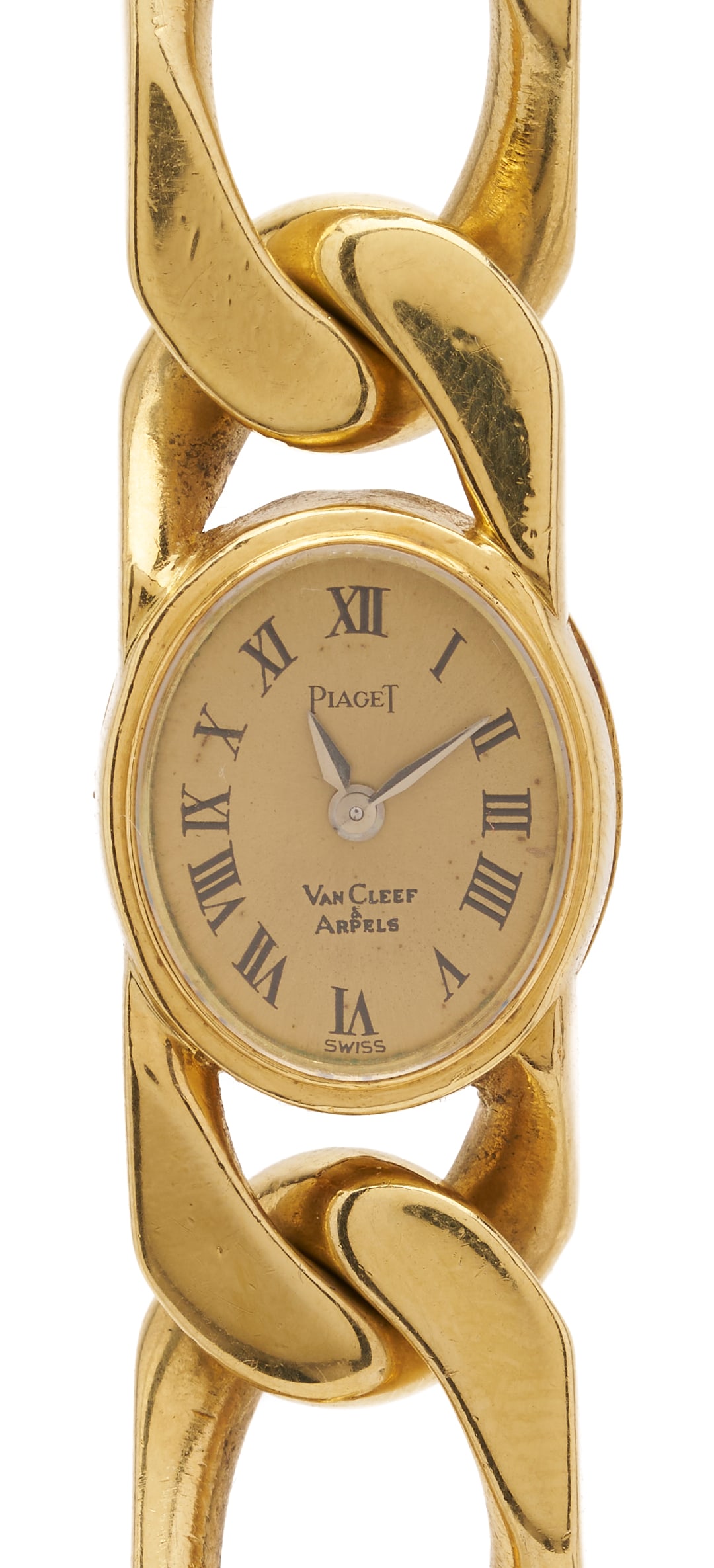 18K Piaget Gourmette Bracelet Watch, Van Cleef & Arpels: 18K Piaget Gourmette Bracelet Watch retailed by Van Cleef & Arpels. Champagne oval dial with Roman Numeral markers and marked "Piaget" and "Van Cleef & Arpels". Back of the dial marked 3771 N65 and