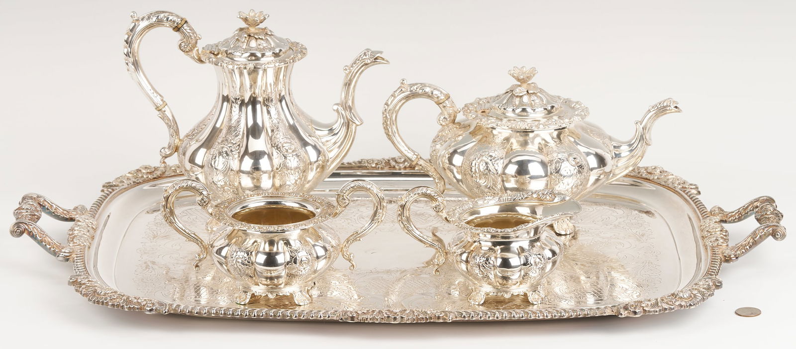 4 Pc. Barker Ellis Sterling Silver Tea Set w/ Silverplate Tray: Barker Ellis sterling silver tea service consisting of teapot, coffee pot, sugar bowl, and creamer, each hallmarked for Birmingham, England, 1866. All pieces of melon form with chased and