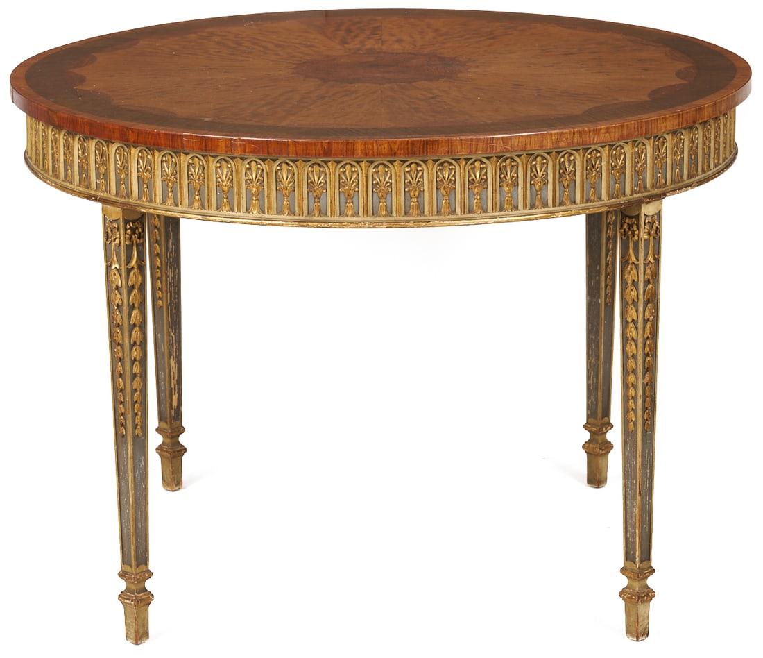Italian Neoclassical Style Inlaid Table: An Italian Neoclassical style center or small dining table, featuring a circular inlaid top, painted skirt with carved stylized leaf and arch overlay, on four square tapering legs with