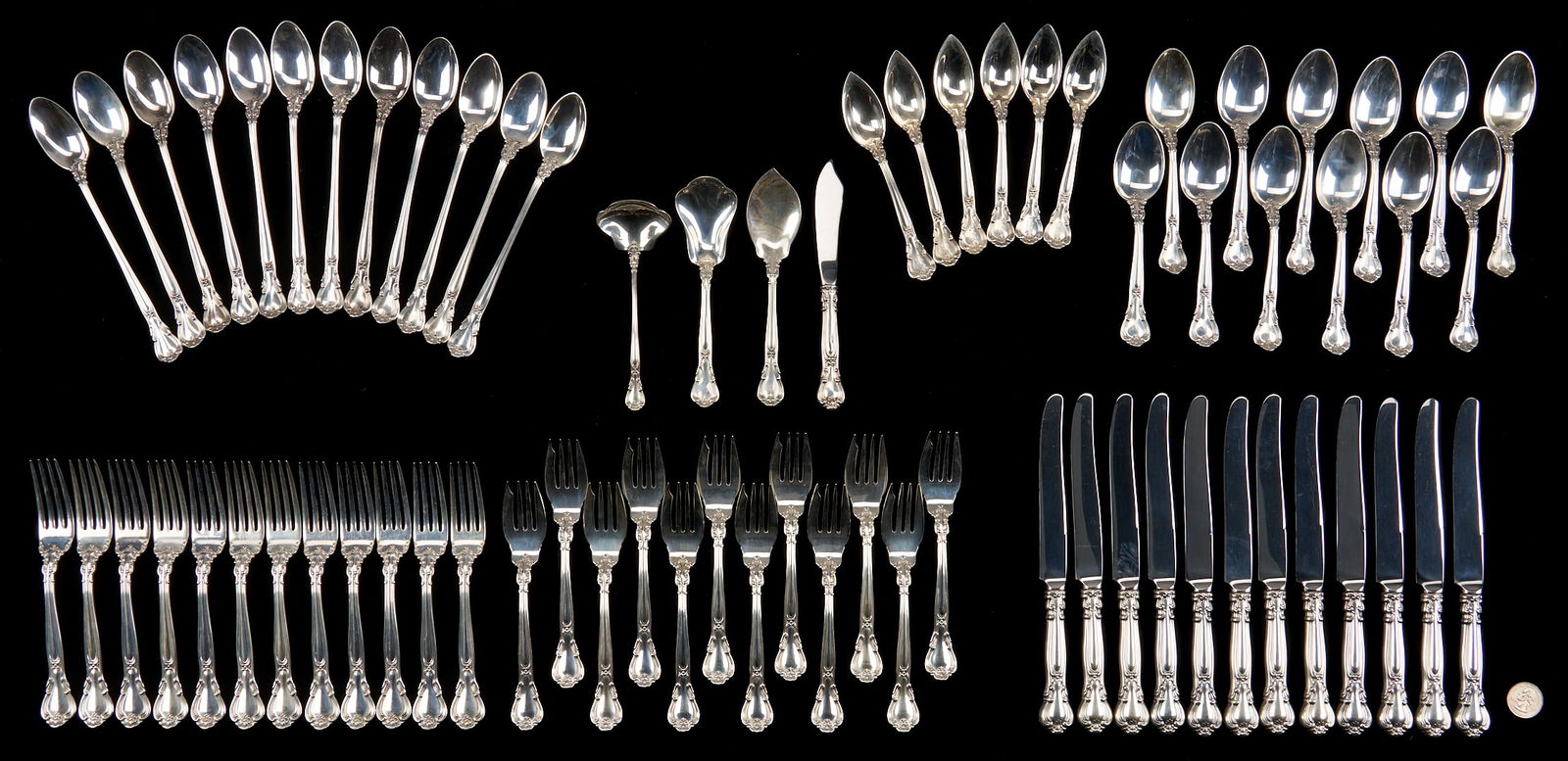 70 Pcs. Gorham Chantilly Sterling Flatware: Seventy (70) pieces of Gorham Chantilly pattern sterling flatware including 12 dinner knives (8 7/8 in. L), 12 dinner forks (7 in. L), 12 salad forks, 12 teaspoons, 12 iced tea spoons, 6 fruit spoons,