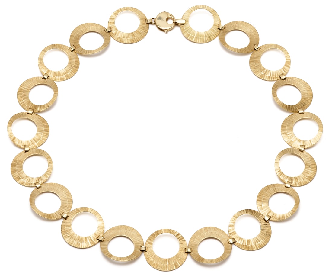 14K Italian Gold Circle Necklace: Ladies' 14K yellow gold Italian circle link necklace with smooth and textured links. The necklace is marked "14K Italy" and XRF tests 14K gold. The necklace is 17 in. L. and weighs