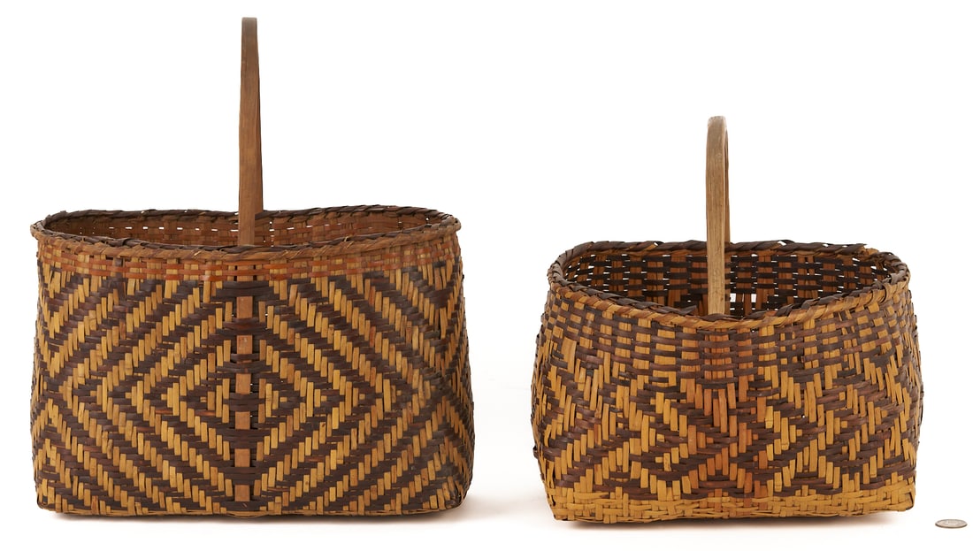 2 Native American Cherokee Rivercane Baskets: Two (2) Native American Cherokee rivercane baskets. 1st item: A purse form basket with walnut and butternut weavers woven in a radiating chief's daughter design with a hickory handl