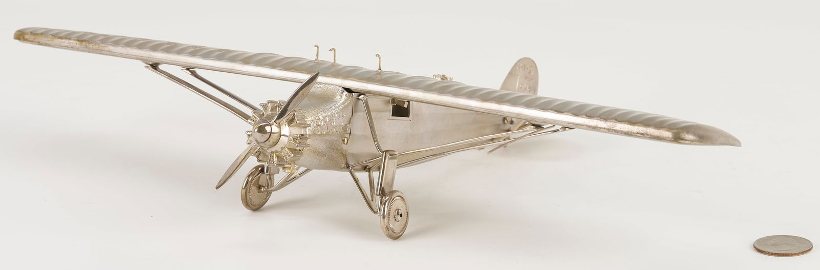 Paramount Classics Sterling Silver Model Airplane, Spirit of St. Louis: Sterling Silver Paramount Classics Limited Edition SPIRIT OF ST. LOUIS model airplane N-X-211ESW, numbered 41 of 1000. Edition number and maker's hallmarks to the upper wing, additional marks (Lon
