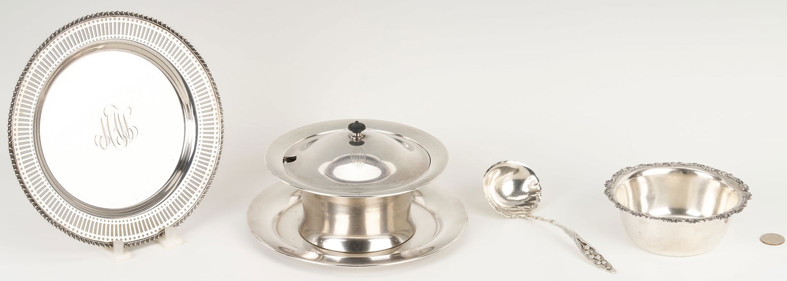 4 Pcs. Sterling Hollowware, incl. Sauce Dish: Four (4) sterling silver hollowware table items, including 1 Towle Sterling Silver round sauce serving dish with attached underplate; 1 associated Whiting Lily of the Valley pattern gravy ladle;