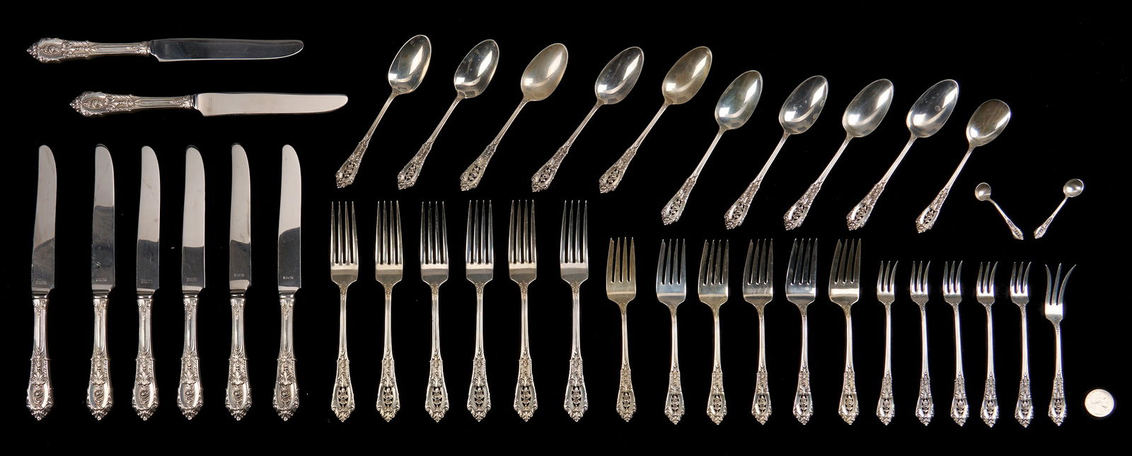38 pcs Wallace Rosepoint Sterling Silver Flatware: 38 pieces Wallace Rosepoint Sterling Silver flatware. Includes 8 dinner knives (9 3/4 in.); 6 dinner forks (7 3/4 in.); 6 salad/dessert forks; 9 teaspoons; 5 seafood/cocktail forks; 1 small