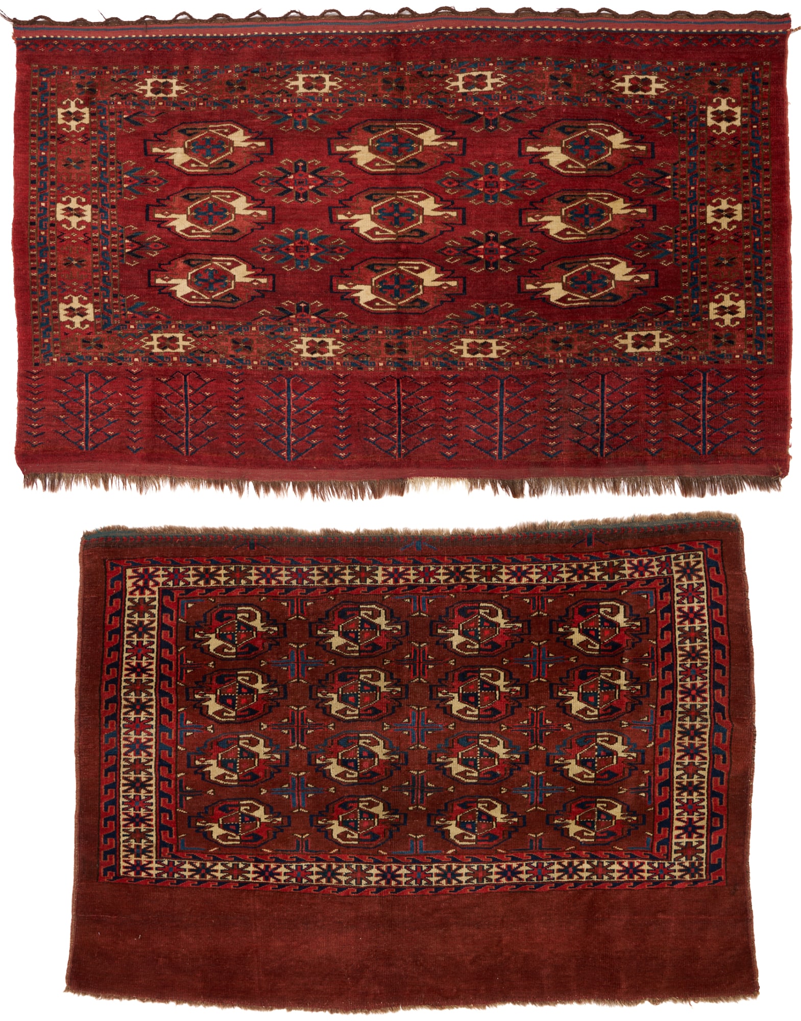2 Antique Turkman Yomud Chuvals: Two (2) antique Yomud or Yomut Turkmen Chuval rugs, wool on wool, including one with four rows of four guls on a stylized ground and plain lower elem panel within three primary borders, and one w