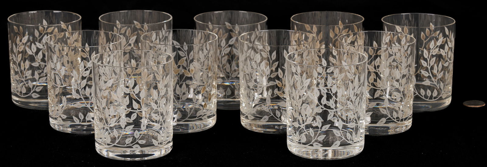 11 Lalique Glass Tumblers, Liane Doree Pattern: Set of eleven (11) Lalique crystal tumblers or Old Fashioned glasses in Liane Doree pattern, with frosted tree branches and leaves. Each signed "Lalique, France" to the