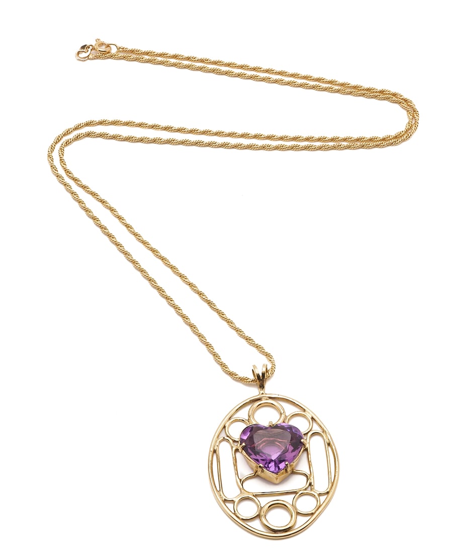 14K Gold & Amethyst Necklace: Ladies' 14K yellow gold two (2) strand rope necklace with 14K yellow gold pendant featuring one (1) heart shaped amethyst. The necklace is marked "14K AD" and both necklace and pendant X