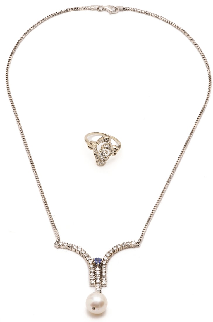 14K Gold & Diamond Necklace & Ring: 1st item: Ladies' 14K white gold necklace featuring thirty-four (34) round brilliant cut diamonds approximately 2.04 carats together, Clarity-SI2, Color-H, one (1) round cut synthetic sapphire, an