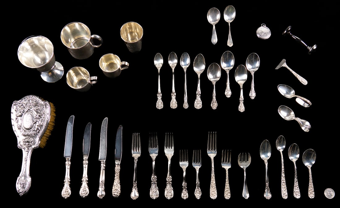 37 Assorted Sterling Items, mostly Baby or Youth Related: Thirty-seven (37) assorted youth or baby sterling items including 3 baby cups, two marked for Reed & Barton and International Silver; 1 Towle baby rattle; 4 Steiff repousee pieces, a baby
