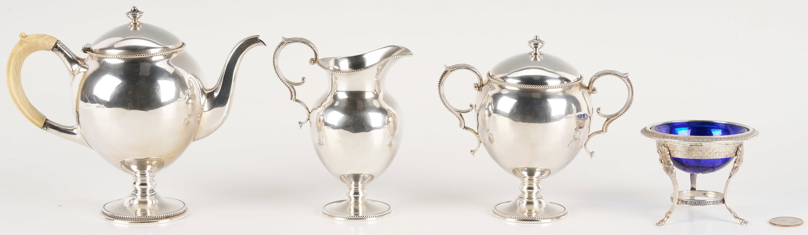 3 pc Sterling Bachelor's Tea Set plus Footed Salt: 1st through 3rd items: "Bachelor's" Tea Set with individual sized bullet form teapot, sugar and creamer, marks for Gorham and Howard & Co. Teapot 6 in. H. 22.65 oz troy combined
