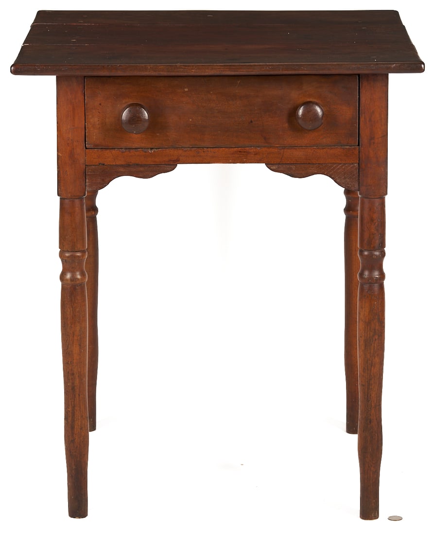 East TN Walnut One Drawer Table: East Tennessee (Hawkins or Greene County) one drawer table, walnut and cherry primary, yellow pine and poplar secondary. Three board, pegged overhanging top above one dovetailed drawer with the o