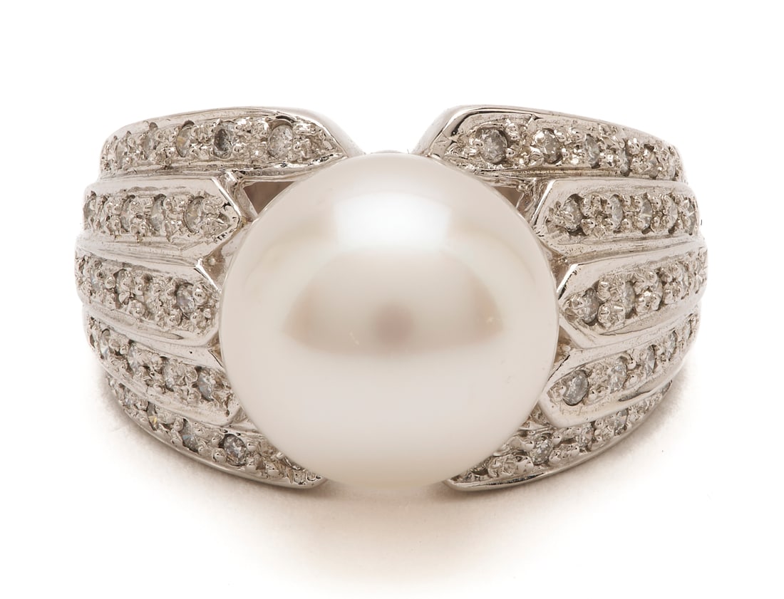 18K Gold, Pearl & Diamond Ring: Ladies' 18K white gold ring featuring one (1) cultured pearl approximately 11.4mm accented by ninety-eight (98) melee diamonds. The ring is marked "18K" and XRF tests 18K gold. The ring is size 7 1/2