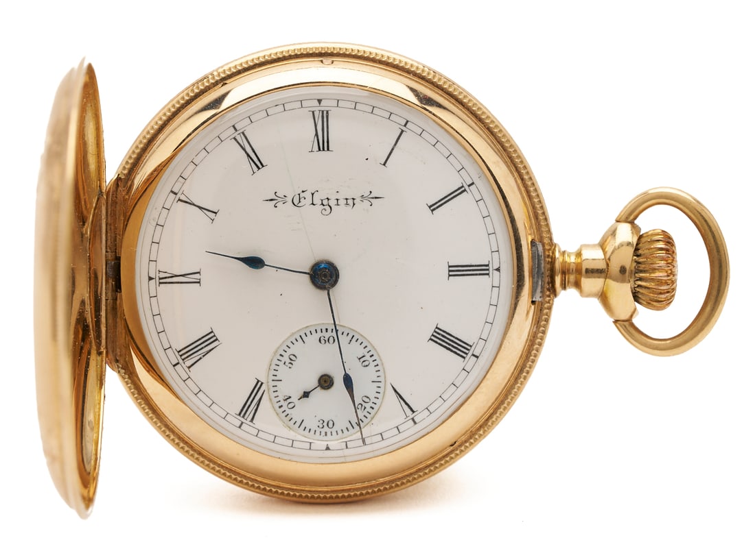 14K Elgin Grade 222 Pocket Watch: Elgin grade 222 7 jewel size 0s pocket watch. The watch is in a 14K yellow gold hunting case with arched trefoil and garland engraving. The case is marked "14K" and XRF tests 14K gold. The