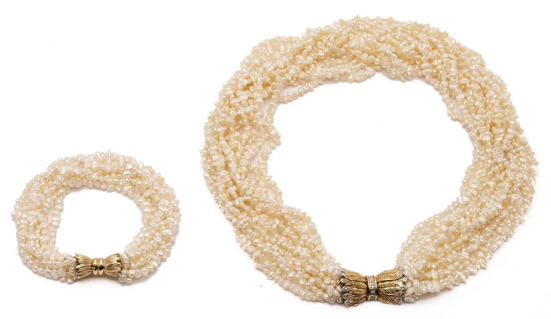 Multi Strand Freshwater Pearl Necklace & Bracelet: 1st item: Ladies' eleven (11) strand pearl necklace featuring one thousand five hundred twenty-nine (1,529) freshwater pearls. The necklace has a 14K yellow gold clasp marked "14K585" an